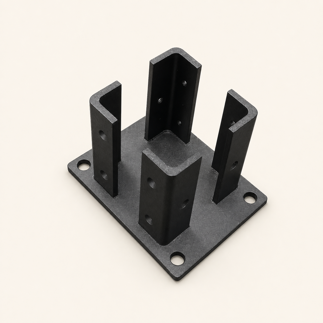 Heavy-duty black Compoxen concrete-mount post bracket on a warm studio background